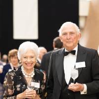Couple posing in the Grand Gallery at DeVos Place.